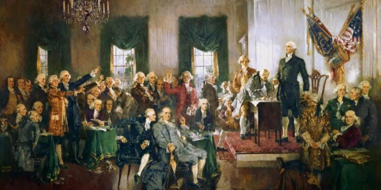 1787년 필라델피아 연방헌법제정회의(Constitutional Convention) 모습을 그린 기록화. 55명의 대표자 중 서명한 39명 ‘건국의 아버지(The Founding Fathers)'들이 묘사돼 있다. 앞에 단상에 서 있는 사람이 만장일치로 의장에 추대된 조지 워싱턴, 앞에 지팡이 들고 의자에 앉은 사람은 81세의 벤저민 프랭클린, 그 뒤는 초대 재무장관을 역임한 알렉산더 해밀턴이다. 4개월간의 격론 끝에 9월 17일 최종 확정된 연방헌법은 이듬해인 1788년 11개주의 비준을 거쳐 공식 발효됐다. [중앙포토]