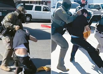 지난 18일 DHS 소속 요원들이 애너하임의 한 세차장에서 직원들을 체포하고 있다. [KTLA캡처]