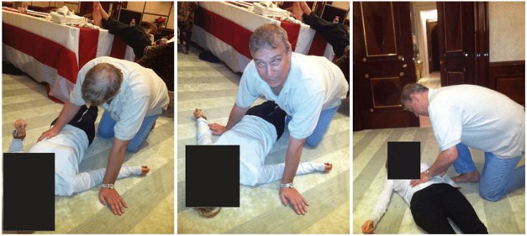 연방 법무부가 공개한 엡스타인 파일 중 영국 앤드류 왕자가 여성의 위에 무릎을 꿇고 있는 모습의 사진. [로이터]