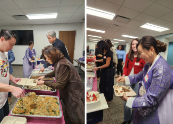 설맞이 행사 참석자들이 한식을 접시에 담고 있다.