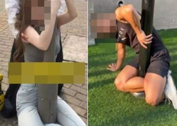 최근 중국 소셜미디어(SNS)에서 유행 중인 ‘가로등 챌린지’에 도전하는 모습. 사진 SNS 캡처